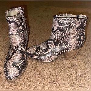 Snakeskin heeled boots. Size 7.5
